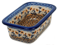 A picture of a Polish Pottery Bread Baker (Hummingbird Harvest) | Z150S-JZ35 as shown at PolishPotteryOutlet.com/products/9-5-x-6-bread-baker-hummingbird-harvest-z150s-jz35