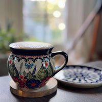 A picture of a Polish Pottery Zaklady 16 oz. Large Belly Mug (Beaded Turquoise) | Y910-DU203 as shown at PolishPotteryOutlet.com/products/zaklady-16-oz-belly-mug-beaded-turquoise-y910-du203
