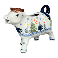 A picture of a Polish Pottery Cow Creamer (Festive Forest) | D081U-INS6 as shown at PolishPotteryOutlet.com/products/cow-creamer-festive-forest-d081u-ins6
