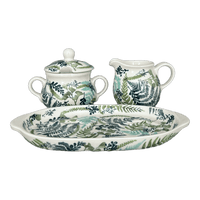 A picture of a Polish Pottery Cream & Sugar Set in "Scattered Ferns" by Manufaktura | K091S-GZ39 as shown at PolishPotteryOutlet.com/products/cream-and-sugar-set-scattered-ferns-k091s-gz39