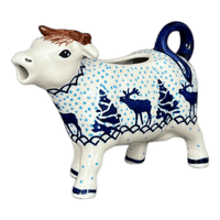 A picture of a Polish Pottery Cow Creamer (Peaceful Season) | D081T-JG24 as shown at PolishPotteryOutlet.com/products/cow-creamer-peaceful-season-d081t-jg24