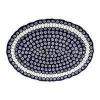 A picture of a Polish Pottery Large Scalloped Oval Platter (Peacock in Line) | P165T-54A as shown at PolishPotteryOutlet.com/products/16-75-x-12-25-large-scalloped-oval-platter-peacock-in-line-p165t-54a