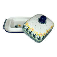 A picture of a Polish Pottery Butter Dish, 7" x 5.5" in "Daffodils in Bloom" by Ceramika Artystyczna | A295-2122X as shown at PolishPotteryOutlet.com/products/c-a-butter-dish-daffodils-in-bloom-a295-2122x