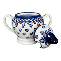 A picture of a Polish Pottery Zaklady Bird Sugar Bowl (Falling Blue Daisies) | Y1234-A882A as shown at PolishPotteryOutlet.com/products/bird-sugar-bowl-falling-blue-daisies-y1234-a882a