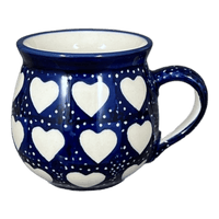 A picture of a Polish Pottery Mug, Belly Mug, Small, 7 oz in "Sea of Hearts" by Manufaktura | K067T-SEA as shown at PolishPotteryOutlet.com/products/small-belly-mug-sea-of-hearts-k067t-sea