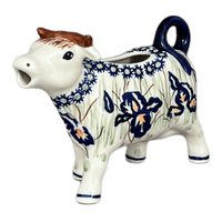 A picture of a Polish Pottery Cow Creamer (Iris) | D081S-BAM as shown at PolishPotteryOutlet.com/products/cow-creamer-iris-d081s-bam
