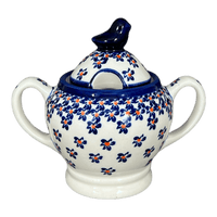 A picture of a Polish Pottery Zaklady Bird Sugar Bowl (Falling Blue Daisies) | Y1234-A882A as shown at PolishPotteryOutlet.com/products/bird-sugar-bowl-falling-blue-daisies-y1234-a882a