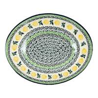 A picture of a Polish Pottery CA 10.25" Oval Dish (Lemons and Leaves) | AC93-2749X as shown at PolishPotteryOutlet.com/products/10-25-oval-dish-lemons-and-leaves-ac93-2749x