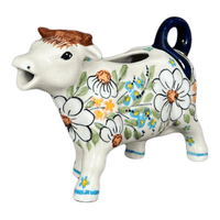 A picture of a Polish Pottery Cow Creamer (Daisy Bouquet) | D081S-TAB3 as shown at PolishPotteryOutlet.com/products/cow-creamer-daisy-bouquet-d081s-tab3
