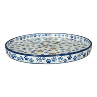 A picture of a Polish Pottery CA 10" Round Tray (Paw Prints) | AE93-1770X as shown at PolishPotteryOutlet.com/products/10-round-tray-paw-prints-ae93-1770x