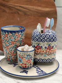 A picture of a Polish Pottery Toothbrush Holder (Scattered Ferns) | P213S-GZ39 as shown at PolishPotteryOutlet.com/products/toothbrush-holder-scattered-ferns-p213s-gz39