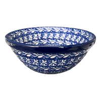 A picture of a Polish Pottery Bowl, Round, Kitchen, 5.5" in "Wavy Blues" by Ceramika Artystyczna | A059-905X as shown at PolishPotteryOutlet.com/products/5-5-bowl-swirling-vines-a059-905x