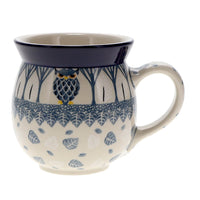 A picture of a Polish Pottery C.A. 16 oz. Belly Mug (Lone Owl) | A073-U4872 as shown at PolishPotteryOutlet.com/products/large-belly-mug-lone-owl