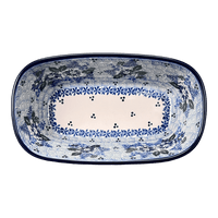 A picture of a Polish Pottery Small Deep Oval Baker (Periwinkle Posies) | A084-U4462 as shown at PolishPotteryOutlet.com/products/small-deep-oval-baker-periwinkle-posies-a084-u4462