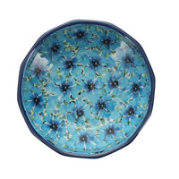 A picture of a Polish Pottery C.A. Multangular Bowl (Bachelor Button Bouquet) | A221-U4929 as shown at PolishPotteryOutlet.com/products/5-multiangular-bowl-bachelor-button-bouquet