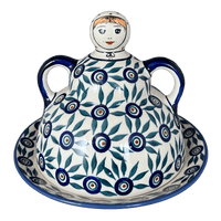 A picture of a Polish Pottery Collectible Cheese Lady (Peacock Parade) | B001U-AS60 as shown at PolishPotteryOutlet.com/products/the-collectible-cheese-lady-peacock-parade-b001u-as60