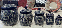 A picture of a Polish Pottery 2 Liter Canister (Floral Peacock) | P074T-54KK as shown at PolishPotteryOutlet.com/products/2-liter-canister-floral-peacock-p074t-54kk