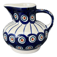 A picture of a Polish Pottery Big Belly Creamer (Peacock in Line) | D008T-54A as shown at PolishPotteryOutlet.com/products/big-belly-creamer-peacock-in-line-d008t-54a