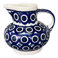A picture of a Polish Pottery Big Belly Creamer (Eyes Wide Open) | D008T-58 as shown at PolishPotteryOutlet.com/products/big-belly-creamer-eyes-wide-open-d008t-58