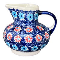 A picture of a Polish Pottery Big Belly Creamer (Daisy Circle) | D008T-MS01 as shown at PolishPotteryOutlet.com/products/big-belly-creamer-ms01-d008t-ms01