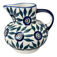 A picture of a Polish Pottery Big Belly Creamer (Peacock Parade) | D008U-AS60 as shown at PolishPotteryOutlet.com/products/big-belly-creamer-peacock-parade-d008u-as60