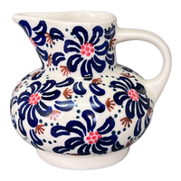 A picture of a Polish Pottery Big Belly Creamer (Floral Fireworks) | D008U-BSAS as shown at PolishPotteryOutlet.com/products/big-belly-creamer-floral-fireworks-d008u-bsas