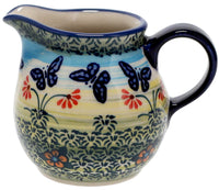 A picture of a Polish Pottery The Cream of Creamers - "Basia" (Butterflies in Flight) | D019S-WKM as shown at PolishPotteryOutlet.com/products/the-cream-of-creamers-basia-butterflies-in-flight-d019s-wkm