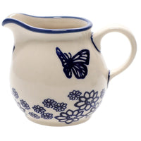 A picture of a Polish Pottery The Cream of Creamers - "Basia" (Butterfly Garden) | D019T-MOT1 as shown at PolishPotteryOutlet.com/products/the-cream-of-creamers-basia-butterfly-garden