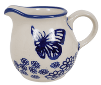A picture of a Polish Pottery The Cream of Creamers - "Basia" (Butterfly Garden) | D019T-MOT1 as shown at PolishPotteryOutlet.com/products/the-cream-of-creamers-basia-butterfly-garden