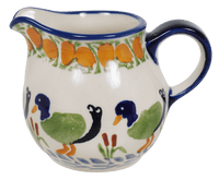 A picture of a Polish Pottery The Cream of Creamers - "Basia" (Ducks in a Row) | D019U-P323 as shown at PolishPotteryOutlet.com/products/the-cream-of-creamers-basia-ducks-in-a-row