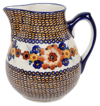 A picture of a Polish Pottery 3 Liter Pitcher (Bouquet in a Basket) | D028S-JZK as shown at PolishPotteryOutlet.com/products/the-3-liter-pitcher-bouquet-in-a-basket