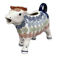 A picture of a Polish Pottery Cow Creamer (Speckled Rainbow) | D081M-AS37 as shown at PolishPotteryOutlet.com/products/cow-creamer-speckled-rainbow-d081m-as37