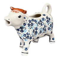 A picture of a Polish Pottery Cow Creamer (Scattered Blues) | D081S-AS45 as shown at PolishPotteryOutlet.com/products/cow-creamer-scattered-blues-d081s-as45