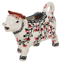 A picture of a Polish Pottery Cow Creamer (Cherry Blossom) | D081S-DPGJ as shown at PolishPotteryOutlet.com/products/cow-creamer-cherry-blossom