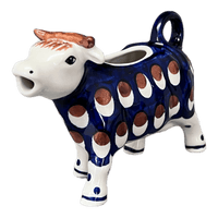 A picture of a Polish Pottery Cow Creamer (Pheasant Feathers) | D081T-52 as shown at PolishPotteryOutlet.com/products/cow-creamer-pheasant-feathers-d081t-52