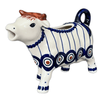 A picture of a Polish Pottery Cow Creamer (Peacock in Line) | D081T-54A as shown at PolishPotteryOutlet.com/products/cow-creamer-peacock-in-line-d081t-54a