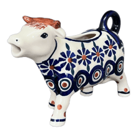A picture of a Polish Pottery Cow Creamer (Floral Peacock) | D081T-54KK as shown at PolishPotteryOutlet.com/products/cow-creamer-floral-peacock-d081t-54kk