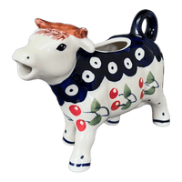 A picture of a Polish Pottery Cow Creamer (Cherry Dot) | D081T-70WI as shown at PolishPotteryOutlet.com/products/cow-creamer-cherry-dot-d081t-70wi