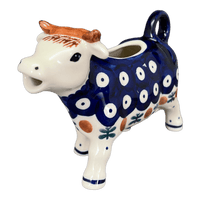 A picture of a Polish Pottery Cow Creamer (Mosquito) | D081T-70 as shown at PolishPotteryOutlet.com/products/cow-creamer-mosquito-d081t-70