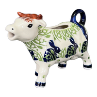 A picture of a Polish Pottery Cow Creamer (Bunny Love) | D081T-P324 as shown at PolishPotteryOutlet.com/products/cow-creamer-bunny-love-d081t-p324