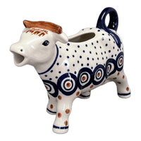 A picture of a Polish Pottery Cow Creamer (Peacock Dot) | D081U-54K as shown at PolishPotteryOutlet.com/products/cow-creamer-peacock-dot-d081u-54k
