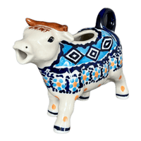 A picture of a Polish Pottery Cow Creamer (Blue Diamond) | D081U-DHR as shown at PolishPotteryOutlet.com/products/cow-creamer-blue-diamond-d081u-dhr
