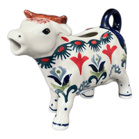 A picture of a Polish Pottery Cow Creamer (Scandinavian Scarlet) | D081U-P295 as shown at PolishPotteryOutlet.com/products/cow-creamer-scandinavian-scarlet-d081u-p295