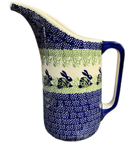 A picture of a Polish Pottery 1.5 Liter Fancy Pitcher (Bunny Love) | D084T-P324 as shown at PolishPotteryOutlet.com/products/1-5-liter-fancy-pitcher-bunny-love-d084t-p324
