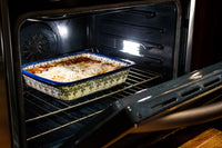 A picture of a Polish Pottery Deep Dish Lasagna Pan (Butterflies in Flight) | Z139S-WKM as shown at PolishPotteryOutlet.com/products/deep-dish-lasagna-pan-butterflies-in-flight