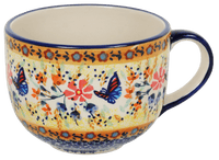 A picture of a Polish Pottery Latte Cup (Butterfly Bliss) | F044S-WK73 as shown at PolishPotteryOutlet.com/products/large-latte-soup-cups-butterfly-bliss