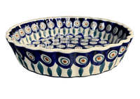 A picture of a Polish Pottery 7.5" Small Quiche Dish (Peacock) | F055T-54 as shown at PolishPotteryOutlet.com/products/the-small-quiche-dish-peacock-f055t-54