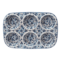 A picture of a Polish Pottery Muffin Pan (Scattered Blues) | F093S-AS45 as shown at PolishPotteryOutlet.com/products/muffin-pan-scattered-blues-f093s-as45