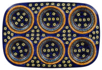 A picture of a Polish Pottery Muffin Pan (Floral Formation) | F093S-WKK as shown at PolishPotteryOutlet.com/products/muffin-pan-floral-formation