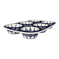 A picture of a Polish Pottery Muffin Pan (Floral Peacock) | F093T-54KK as shown at PolishPotteryOutlet.com/products/muffin-pan-floral-peacock-f093t-54kk